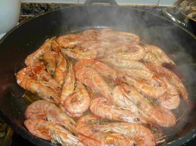 Llagostins al whisky